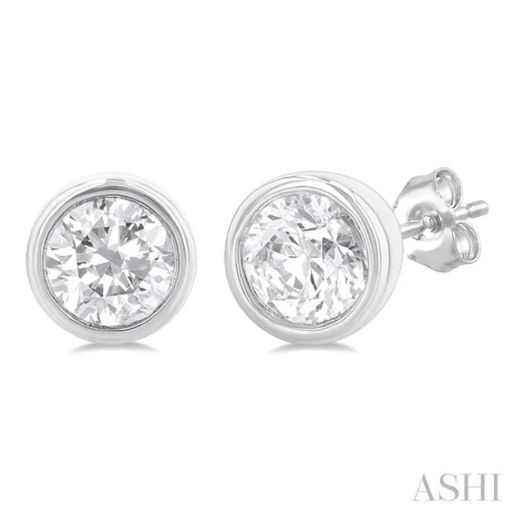 1/5 Ctw Petite Bezel Set Round Cut Diamond Fashion Stud Earring in 10K White Gold