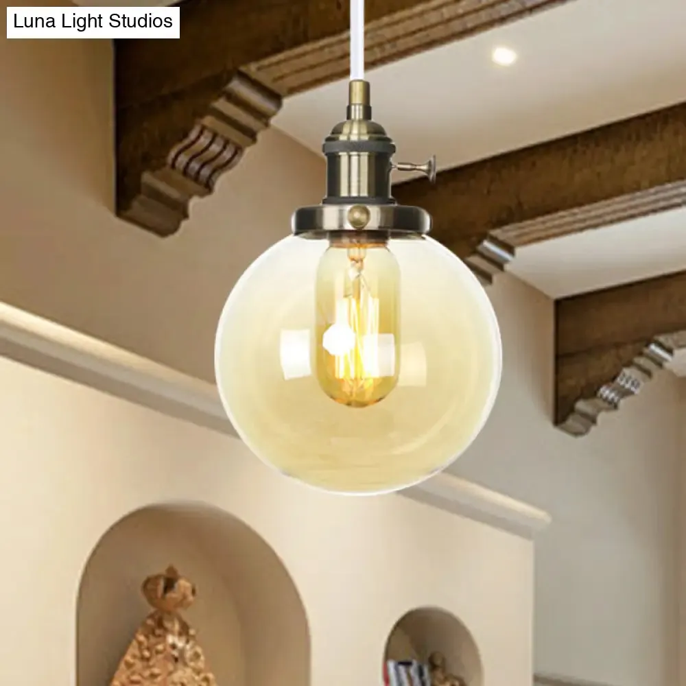 Farmhouse Orbit Pendant Light with Amber/Clear Glass and Adjustable Cord in 3 Elegant Finish Options